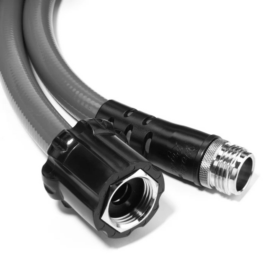 Clearsource 25 ft stainless‑steel braided RV water hose coiled next to travel trailer hookup