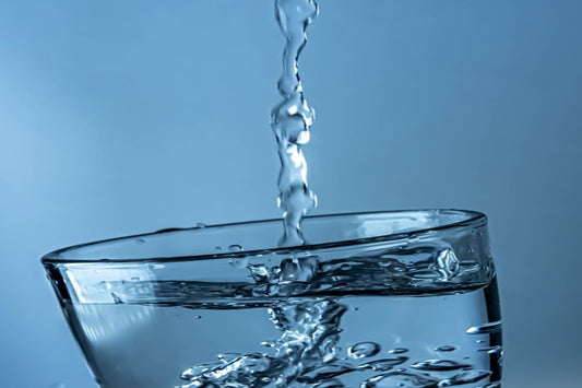 Flowing tap water into a glass