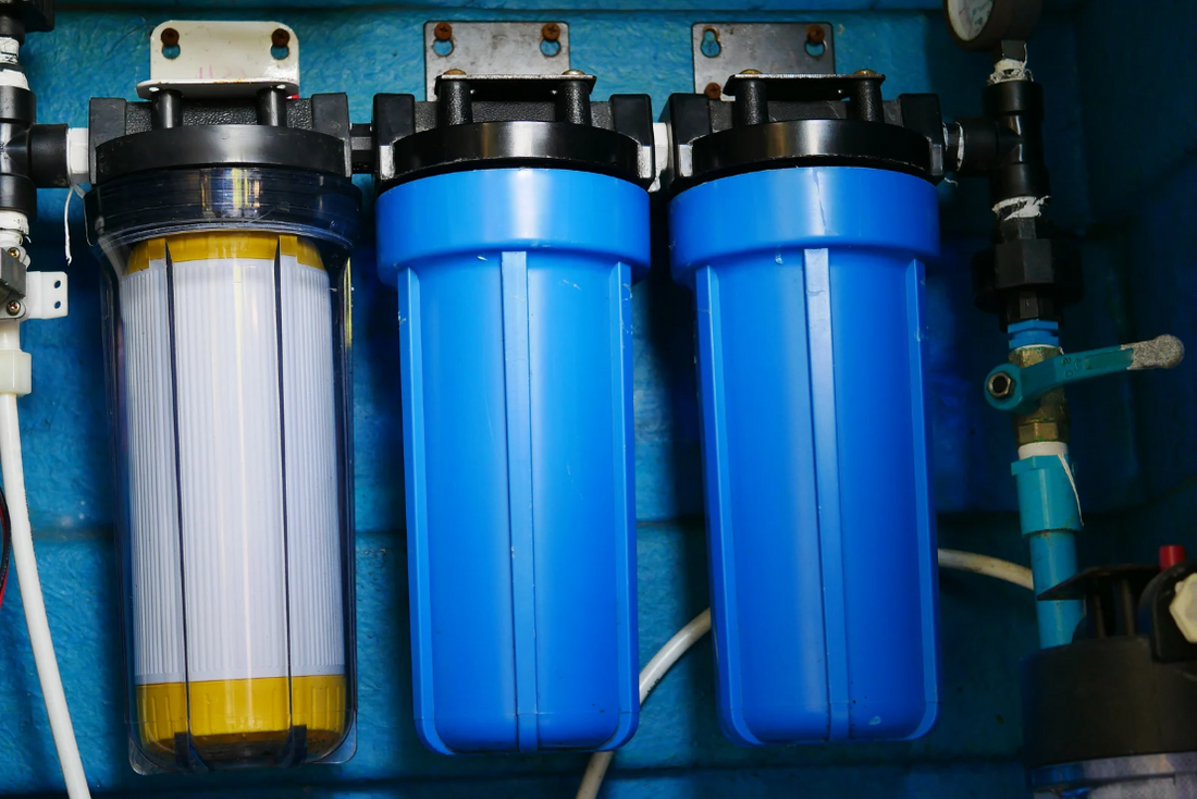 Modern whole house water filtration system providing clean filtered water for residential home