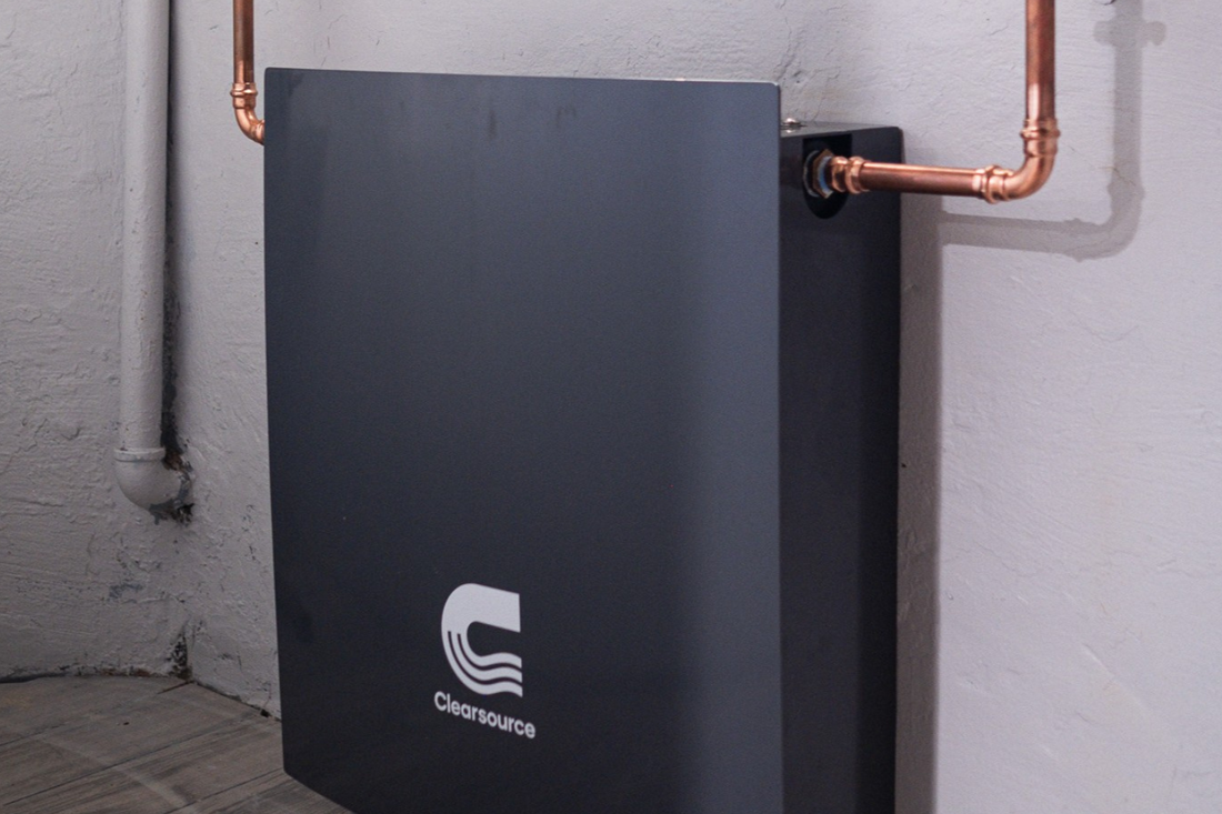 ClearSource 3 stage whole house water filtration system with virus protection installed in basement utility room