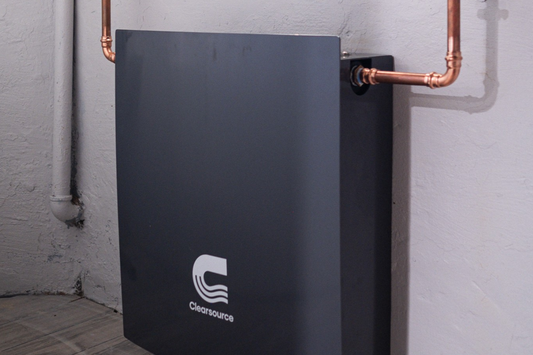 ClearSource 3 stage whole house water filtration system with virus protection installed in basement utility room