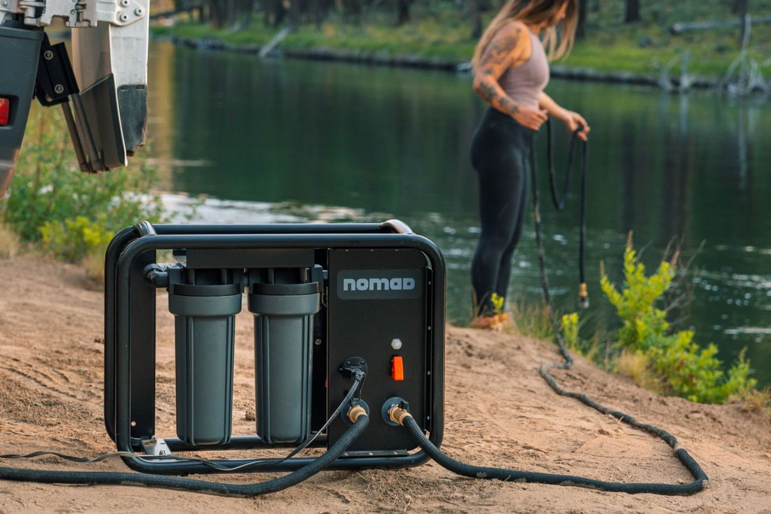 Solar-powered water filtration system purifying creek water at remote off-grid camping site