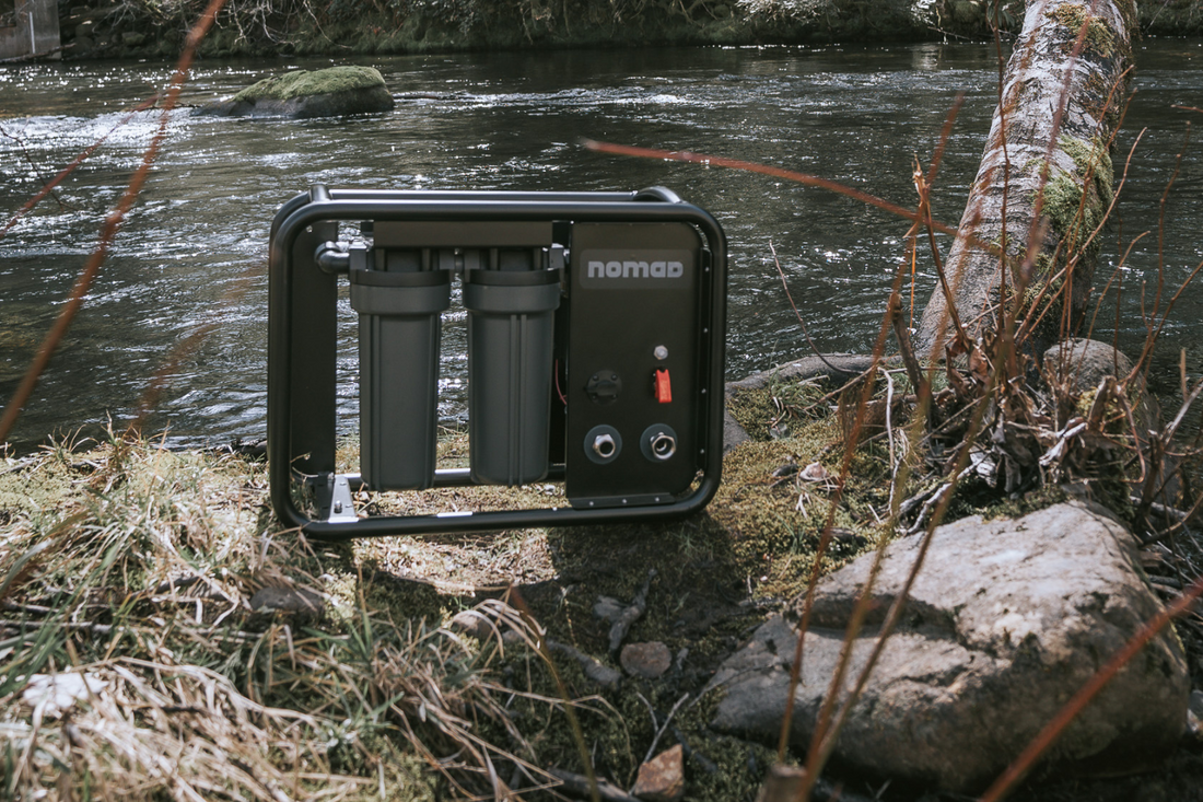 Portable water purification system setup for off-grid RV camping adventure in wilderness
