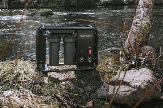 Portable water purification system setup for off-grid RV camping adventure in wilderness