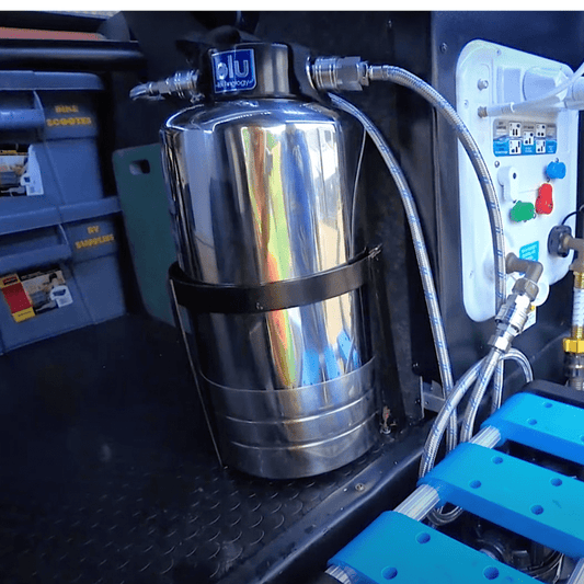 Easy-install portable water softener, reducing hard water buildup in an RV’s plumbing system